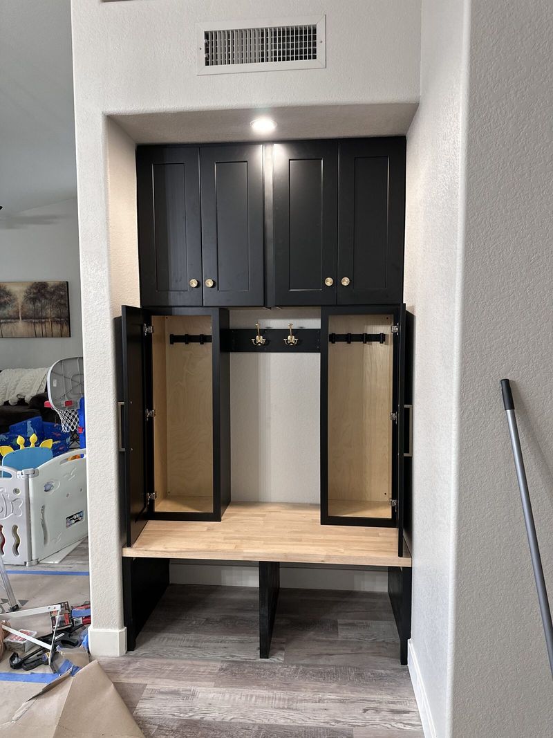 Built-in cabinetry nook with a wood counter