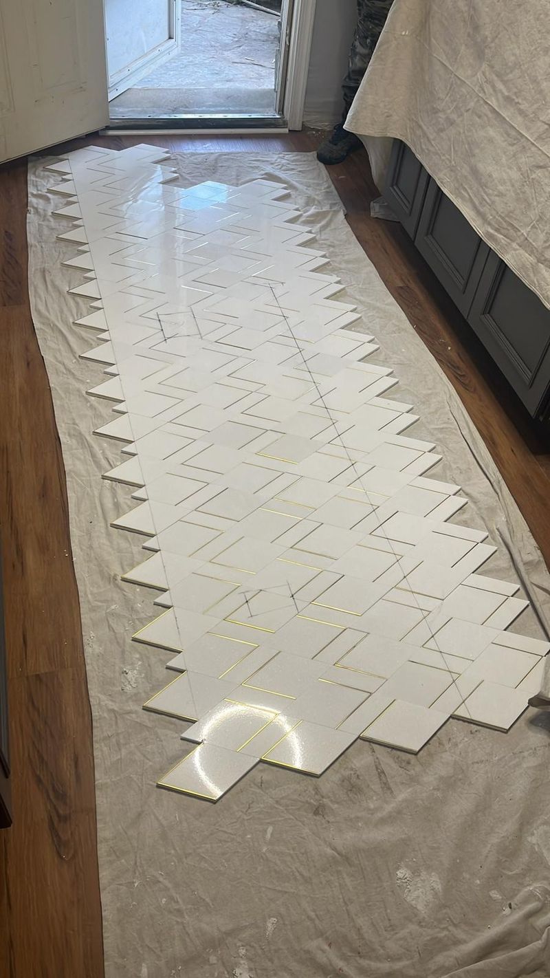 Chevron backsplash tile laid out to plan the pattern