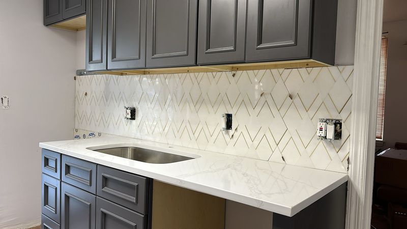 Countertop, sink and backsplash installed