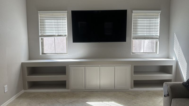 Custom built-in media wall with open shelving