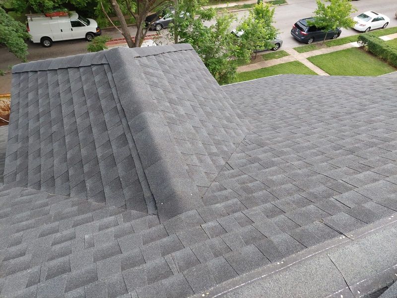 Gray architectural shingle roof after installation